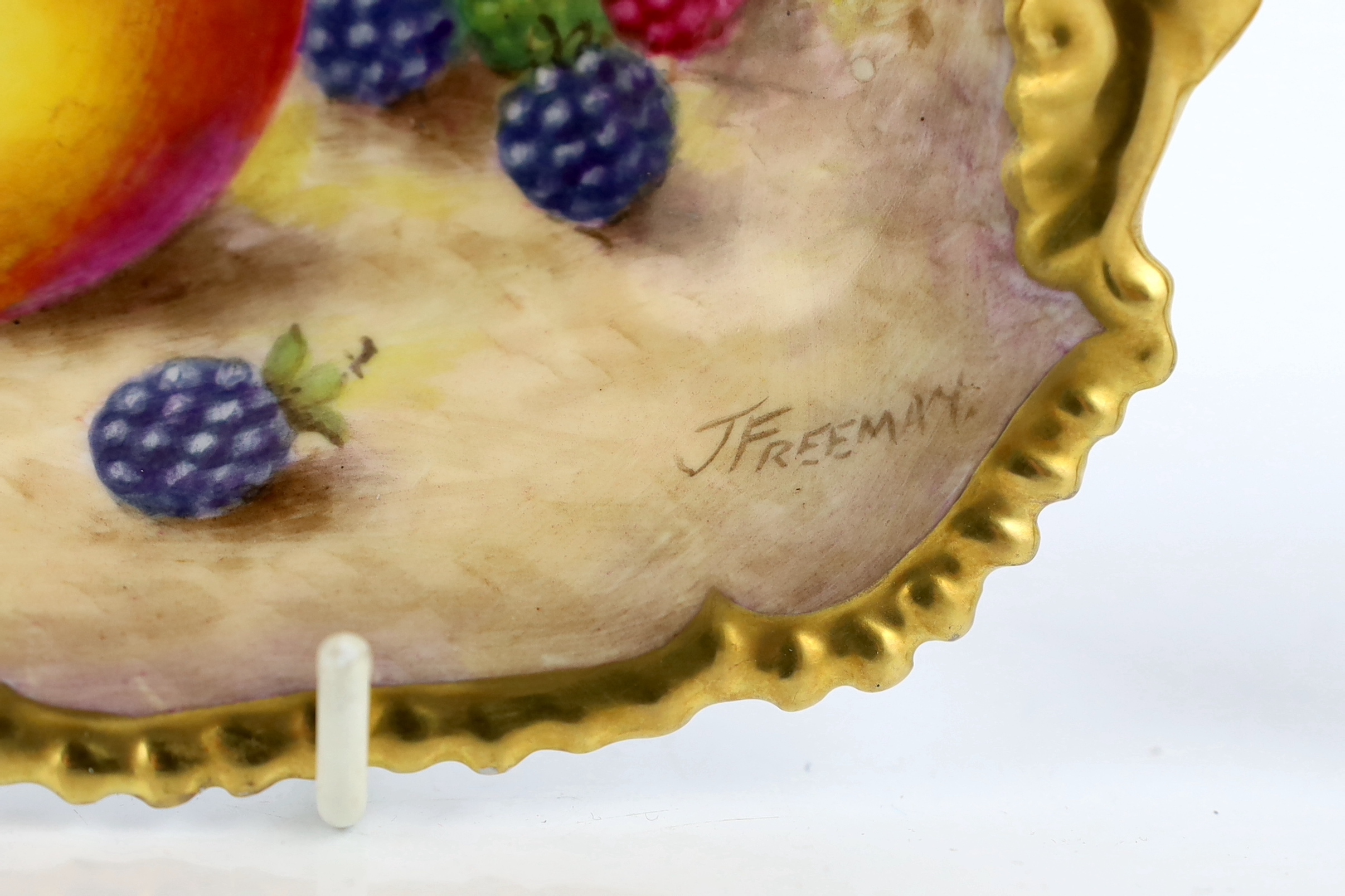 Two Royal Worcester fruit painted dishes, by T. Freeman, mid 20th century